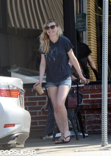 Kirsten Dunst smiled as she carried her iced coffee to the car.
Kirsten Dunst smiled as she carried her iced coffee to the car.