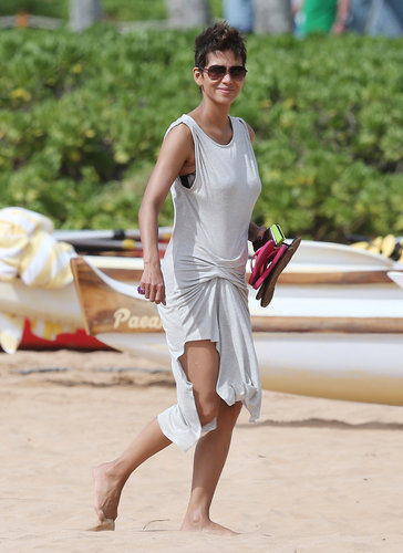 Halle Berry sported a light gray draped dress and aviator sunglasses on her Hawaiian vacation in March.
Halle Berry sported a light gray draped dress and aviator sunglasses on her Hawaiian vacation in March.