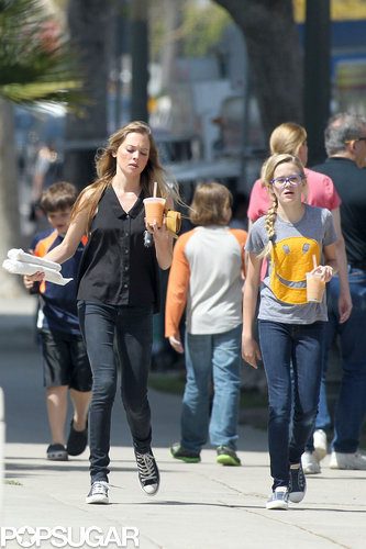 Paulina Slagter and Ava Phillippe carried their drinks to the car.
Paulina Slagter and Ava Phillippe carried their drinks to the car.
