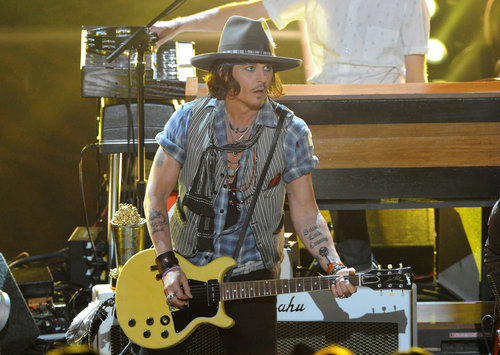 Johnny Depp took the stage to show off his guitar skills at the 2012 show.
Johnny Depp took the stage to show off his guitar skills at the 2012 show.