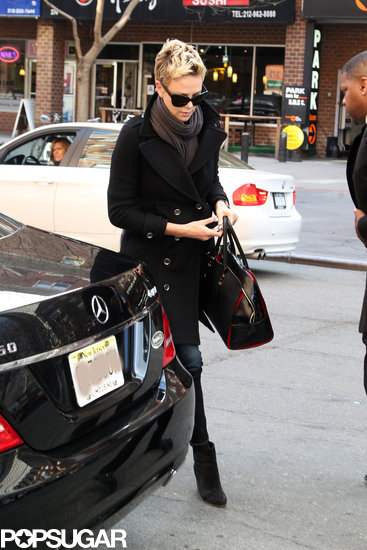 Charlize Theron wore a black peacoat and sunglasses.
Charlize Theron wore a black peacoat and sunglasses.