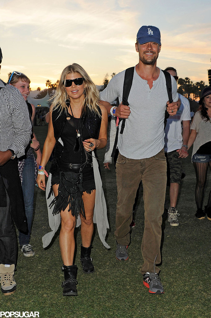Fergie and Josh Duhamel popped up at the festival on the final day in 2012.
Fergie and Josh Duhamel popped up at the festival on the final day in 2012.