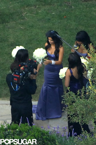 Kim Kardashian wore purple as a bridesmaid for sister Khloé Kardashian's wedding to Lamar Odom at a mansion in Beverly Hills in September 2009.
Kim Kardashian wore purple as a bridesmaid for sister Khloé Kardashian's wedding to Lamar Odom at a mansion in Beverly Hills in September 2009.