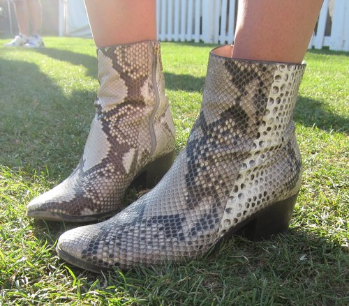 Leather snakeskin booties should be a part of every cool girl's arsenal.
Leather snakeskin booties should be a part of every cool girl's arsenal.