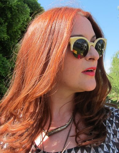 Red hair with red lipstick is twice as nice.
Photo: Meg Cuna
Red hair with red lipstick is twice as nice.
Photo: Meg Cuna