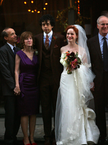 Christina Hendricks and Geoffrey Arend posed with family after their October 2009 nuptials in NYC. For the affair, the Mad Men actress went with a strapless Carolina Herrera gown.
Christina Hendricks and Geoffrey Arend posed with family after their October 2009 nuptials in NYC. For the affair, the Mad Men actress went with a strapless Carolina Herrera gown.