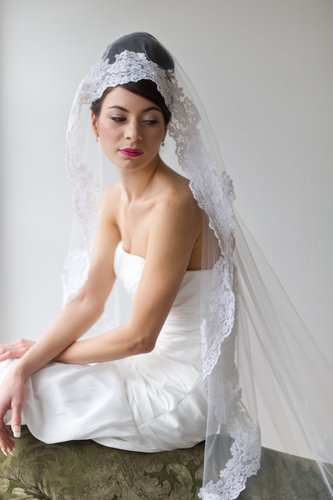This Powder Blue Bijoux traditional cathedral lace veil ($160) features a breathtaking lace detail, and the price tag isn't too bad, either.
This Powder Blue Bijoux traditional cathedral lace veil ($160) features a breathtaking lace detail, and the price tag isn't too bad, either.