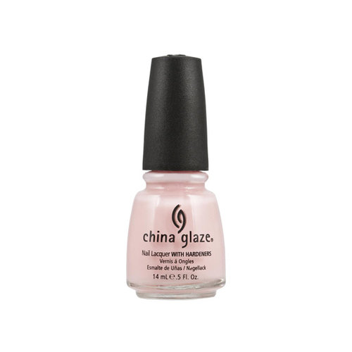 One coat of China Glaze Nail Lacquer in Innocence ($8) leaves your nails looking like a better version of themselves. You can always layer on more for a sweet pink tone.
One coat of China Glaze Nail Lacquer in Innocence ($8) leaves your nails looking like a better version of themselves. You can always layer on more for a sweet pink tone.