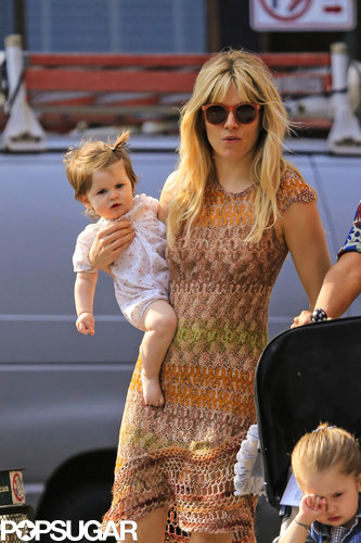 Sienna Miller wore a Missoni dress as she carried Marlowe Sturridge during a playdate in NYC.
Sienna Miller wore a Missoni dress as she carried Marlowe Sturridge during a playdate in NYC.