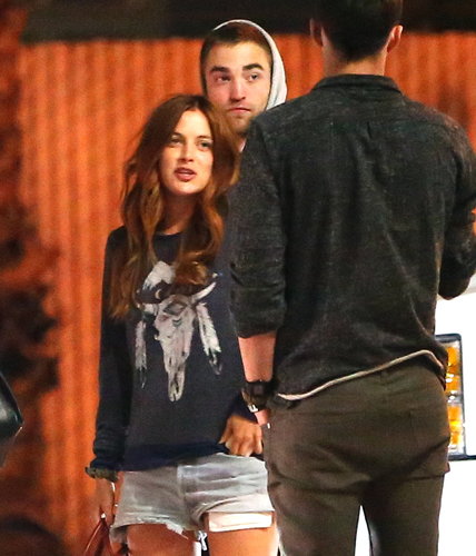 Robert Pattinson met up with pals in the parking lot.
Robert Pattinson met up with pals in the parking lot.