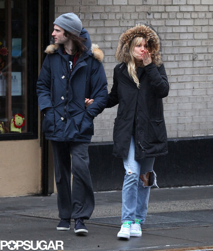 Sienna Miller held onto Tom Sturridge for a couple's stroll in NYC.
Sienna Miller held onto Tom Sturridge for a couple's stroll in NYC.