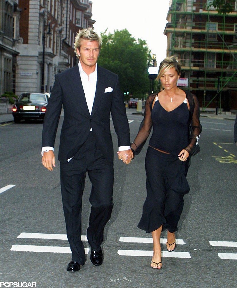 Victoria was pregnant with son Romeo in July 2002 as she and David attended the christening of Elizabeth Hurley's son in London.
Victoria was pregnant with son Romeo in July 2002 as she and David attended the christening of Elizabeth Hurley's son in London.
