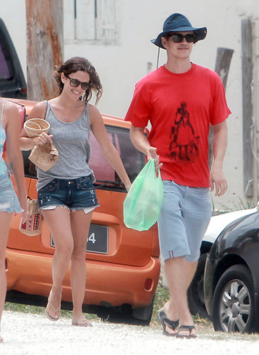 On another beach day in Barbados with boyfriend Hayden Christensen, Rachel sported a gray tank with her denim cutoffs, nude flip-flops, Ray-Ban Wayfarers, and her tribal-print bag.
On another beach day in Barbados with boyfriend Hayden Christensen, Rachel sported a gray tank with her denim cutoffs, nude flip-flops, Ray-Ban Wayfarers, and her tribal-print bag.