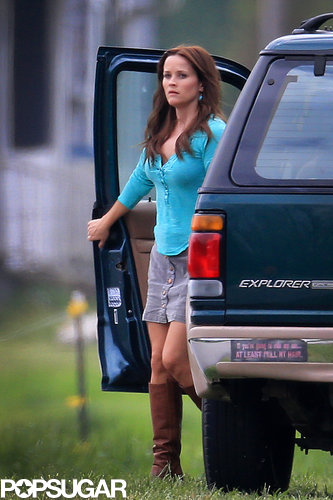 Reese Witherspoon gets out of a car with a cheeky bumper sticker.
Reese Witherspoon gets out of a car with a cheeky bumper sticker.