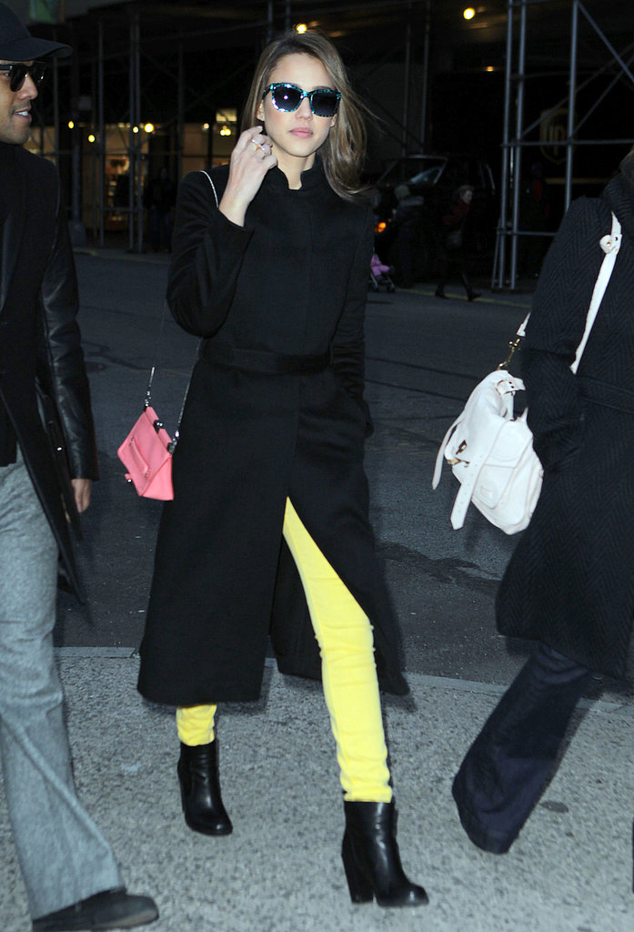 Style so bright, she has to wear shades. While out and about in New York, Jessica paired her black separates with daffodil yellow denim and a pink Loewe bag.
Style so bright, she has to wear shades. While out and about in New York, Jessica paired her black separates with daffodil yellow denim and a pink Loewe bag.