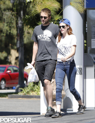 Robert Pattinson Gets Cute With His Pup During an Outing With Kristen Stewart Robert Pattinson Gets Cute With His Pup During an Outing With Kristen Stewart