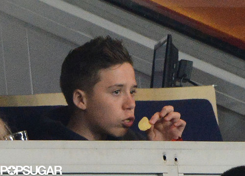 Brooklyn Beckham ate chips while watching his dad play on Sunday.
Brooklyn Beckham ate chips while watching his dad play on Sunday.