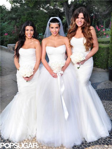 Kim Kardashian had the support of her sisters Kourtney and Khloé at her August 2011 Montecito wedding to Kris Humphries.
Kim Kardashian had the support of her sisters Kourtney and Khloé at her August 2011 Montecito wedding to Kris Humphries.