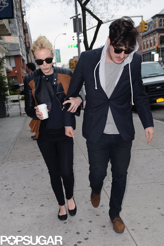 Carey Mulligan held Marcus Mumford's arm as they walked down the street.
Carey Mulligan held Marcus Mumford's arm as they walked down the street.