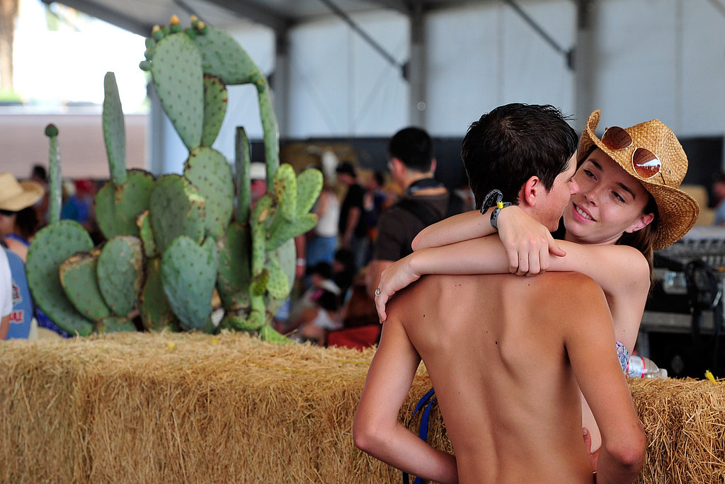 A pair of lovebirds got close at Stagecoach in Indio, CA.
A pair of lovebirds got close at Stagecoach in Indio, CA.