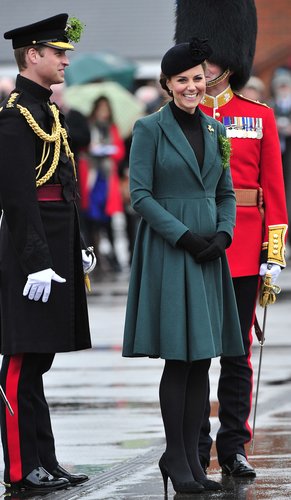 She looked the part of supportive wife and festive St. Patrick's Day-goer in a green coat.
She looked the part of supportive wife and festive St. Patrick's Day-goer in a green coat.