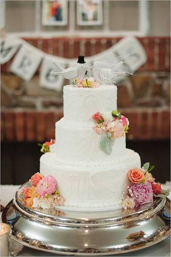 From the doves to the florals to the white beads, everything about this cake is timeless.
Photo by Brett Heidebrecht via Wedding Chicks
From the doves to the florals to the white beads, everything about this cake is timeless.
Photo by Brett Heidebrecht via Wedding Chicks