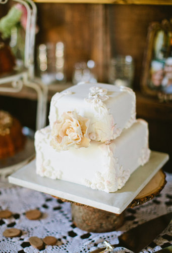 At only two layers high, this pretty, white, floral-covered cake makes a big impact.
Photo by Sarah Layne Photography via 100 Layer Cake
At only two layers high, this pretty, white, floral-covered cake makes a big impact.
Photo by Sarah Layne Photography via 100 Layer Cake