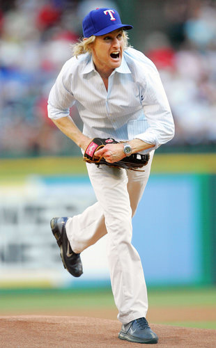Owen Wilson packed the heat on his pitch for the Texas Rangers in July 2005.
Owen Wilson packed the heat on his pitch for the Texas Rangers in July 2005.