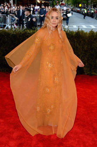 For the night's festivities, Ashley Olsen picked a vintage Dior orange beaded gown with a matching overlay that flowed flawlessly.
For the night's festivities, Ashley Olsen picked a vintage Dior orange beaded gown with a matching overlay that flowed flawlessly.