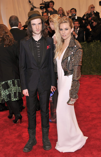 New parents Sienna Miller and Tom Sturridge left baby Marlowe at home to walk the red carpet in punky Burberry studs (for her) and boots (for him).
New parents Sienna Miller and Tom Sturridge left baby Marlowe at home to walk the red carpet in punky Burberry studs (for her) and boots (for him).