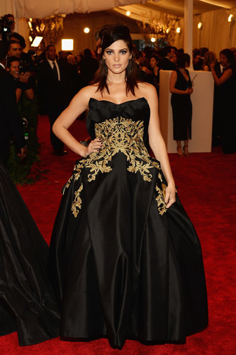 Ashley Greene chose a black-and-gold strapless Marchesa ball gown with Christian Louboutin shoes and Harry Winston yellow diamonds for the Met Gala festivities.
Ashley Greene chose a black-and-gold strapless Marchesa ball gown with Christian Louboutin shoes and Harry Winston yellow diamonds for the Met Gala festivities.