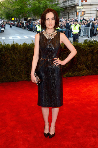 Michelle Dockery's Burberry python-print leather shift dress was ladylike in silhouette but totally punk in fabric. She finished the look with Gianvito Rossi pumps.
Michelle Dockery's Burberry python-print leather shift dress was ladylike in silhouette but totally punk in fabric. She finished the look with Gianvito Rossi pumps.