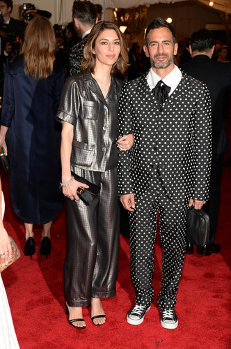 Sofia Coppola sported silky Marc Jacobs pajamas and a Pomellato bracelet, while Marc Jacobs rocked a polka-dot Comme des Garcons suit with Converse sneakers.
Sofia Coppola sported silky Marc Jacobs pajamas and a Pomellato bracelet, while Marc Jacobs rocked a polka-dot Comme des Garcons suit with Converse sneakers.