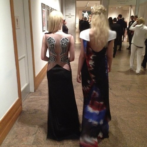 Dakota and Elle Fanning showed off the backs of their Rodarte gowns.
Source: Instagram user officialrodarte
Dakota and Elle Fanning showed off the backs of their Rodarte gowns.
Source: Instagram user officialrodarte