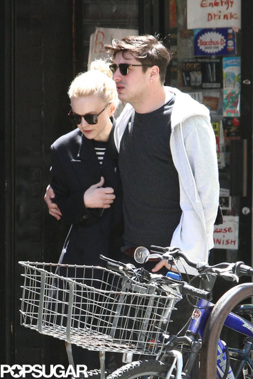 Marcus Mumford put an arm around Carey Mulligan.
Marcus Mumford put an arm around Carey Mulligan.