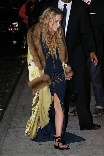 Mary-Kate Olsen dropped by the afterparty in sandals.
Mary-Kate Olsen dropped by the afterparty in sandals.