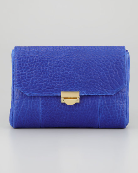 The buttery softness of pebbled leather can't be beat. The texture becomes a visual factor, too, when done in a bright hue like Lauren Merkin's day-appropriate clutch ($325).
The buttery softness of pebbled leather can't be beat. The texture becomes a visual factor, too, when done in a bright hue like Lauren Merkin's day-appropriate clutch ($325).