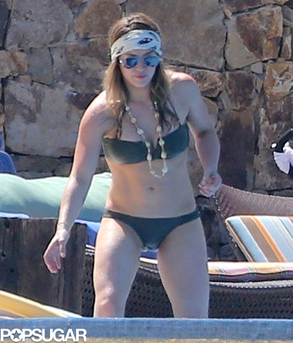 Hilary Duff wore a tiny bikini by the pool.
Hilary Duff wore a tiny bikini by the pool.