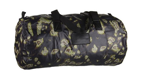 We dig the cool abstract print on this Marc by Marc Jacobs small duffel ($45, originally $78). It's definitely the most fashion-forward of the bunch — and the most "versatile" when it needs to be shoved into the overhead compartment.
We dig the cool abstract print on this Marc by Marc Jacobs small duffel ($45, originally $78). It's definitely the most fashion-forward of the bunch — and the most "versatile" when it needs to be shoved into the overhead compartment.
