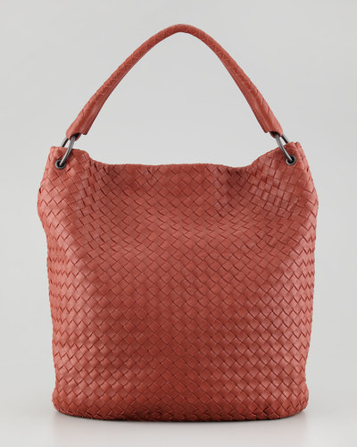 With superior construction and a look that will always be in vogue, there's a pretty good chance a 20-something will keep using this Bottega Veneta bucket bag ($2,420) until retirement hits.
With superior construction and a look that will always be in vogue, there's a pretty good chance a 20-something will keep using this Bottega Veneta bucket bag ($2,420) until retirement hits.