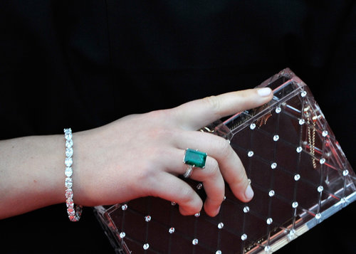 Jennifer Lawrence wore a Chopard square-cut emerald ring and diamond bracelet and carried a clear Lucite clutch.
Jennifer Lawrence wore a Chopard square-cut emerald ring and diamond bracelet and carried a clear Lucite clutch.