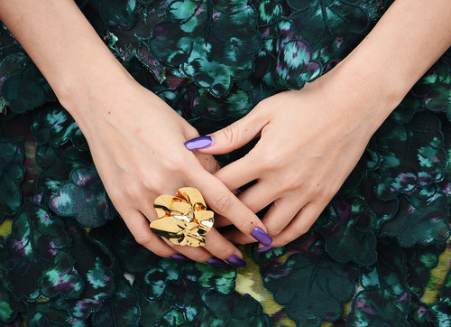 Zhang Ziyi wore an oversize gold-plated ring.
Zhang Ziyi wore an oversize gold-plated ring.