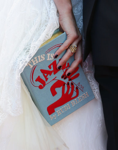 Bérénice Bejo carried an Olympia Le-Tan book clutch.
Bérénice Bejo carried an Olympia Le-Tan book clutch.