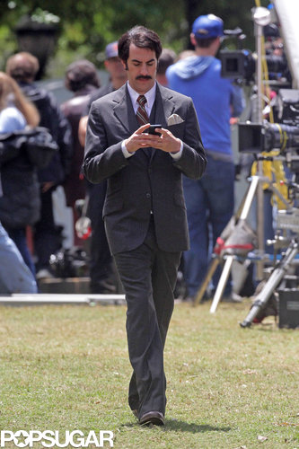 Sacha Baron Cohen strolled around on set.
Sacha Baron Cohen strolled around on set.