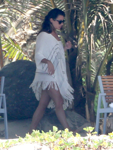 During a getaway to Puerto Vallarta in May 2013, Lea Michele fit right in with her white striped fringe poncho.
During a getaway to Puerto Vallarta in May 2013, Lea Michele fit right in with her white striped fringe poncho.