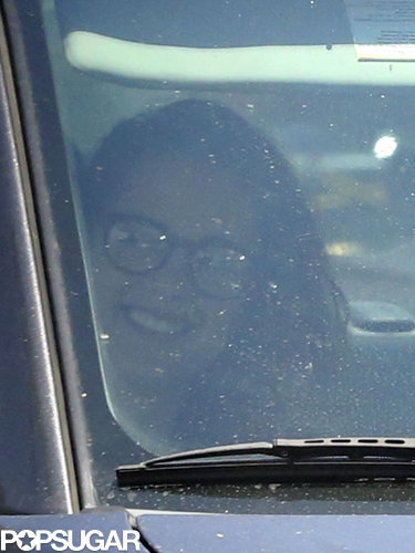 Kristen Stewart smiled in the passenger seat.
Kristen Stewart smiled in the passenger seat.