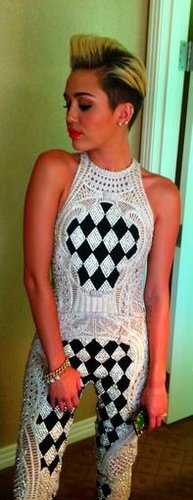 Miley Cyrus showed off her sexy black-and-white Balmain jumpsuit before heading to the Billboard Music Awards.
Source: Twitter user MileyCyrus
Miley Cyrus showed off her sexy black-and-white Balmain jumpsuit before heading to the Billboard Music Awards.
Source: Twitter user MileyCyrus