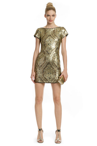 If you saw Beyoncé's Met gala gown with its golden embroidery, it comes as no surprise that she went for this sexy showstopper mini by Nanette Lepore ($90 to rent), which will keep you shining all night long.
If you saw Beyoncé's Met gala gown with its golden embroidery, it comes as no surprise that she went for this sexy showstopper mini by Nanette Lepore ($90 to rent), which will keep you shining all night long.