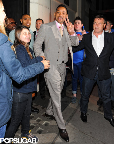 Will Smith greeted fans while leaving a restaurant.
Will Smith greeted fans while leaving a restaurant.