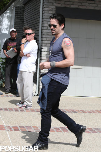Colin Farrell showed off his tattoos.
Colin Farrell showed off his tattoos.